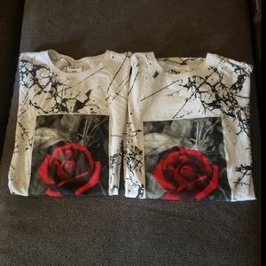 2 White rue 21 T shirts with black splatter and a rose photo on the front.